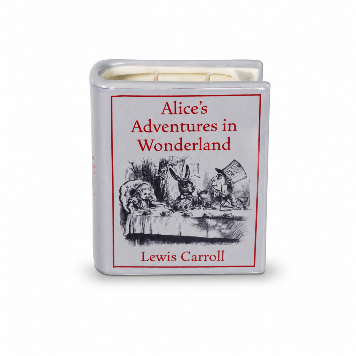 Bougie en céramique bleu pâle en forme de livre Alice au Pays des Merveilles