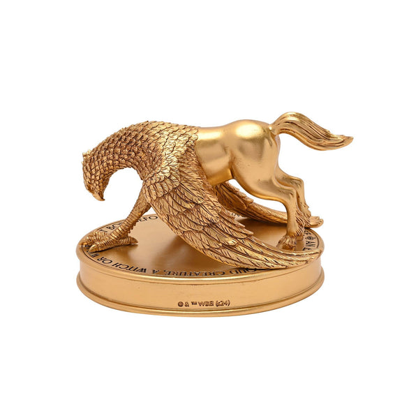 Figurine dorée Harry Potter de Buck l'hippogriffe en posture noble, décoration à poser