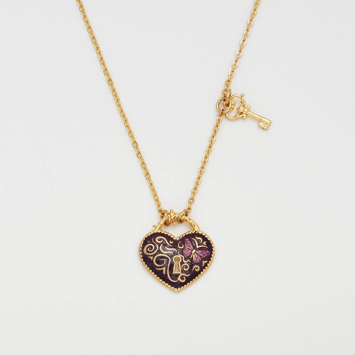 Collier Fable England Eve, pendentif cœur cadenas bordeaux et clé, plaqué or 22 carats