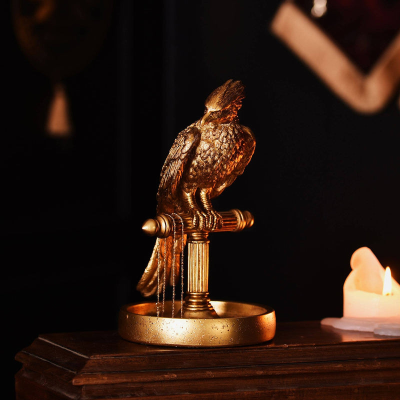 Présentoir à bijoux Harry Potter Fumseck le phénix en résine dorée au fini métallisé