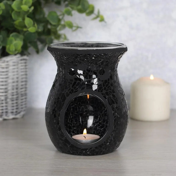 Brûle-parfum en mosaïque de verre noire aux reflets scintillants, ambiance mystique
