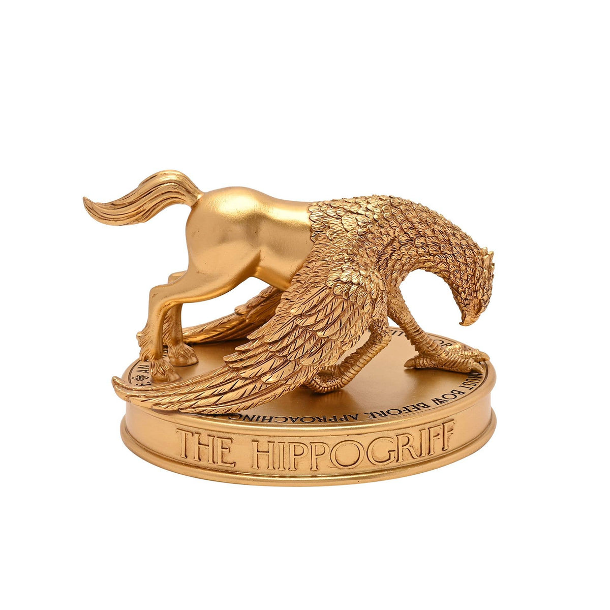 Figurine dorée Harry Potter de Buck l'hippogriffe en posture noble, décoration à poser