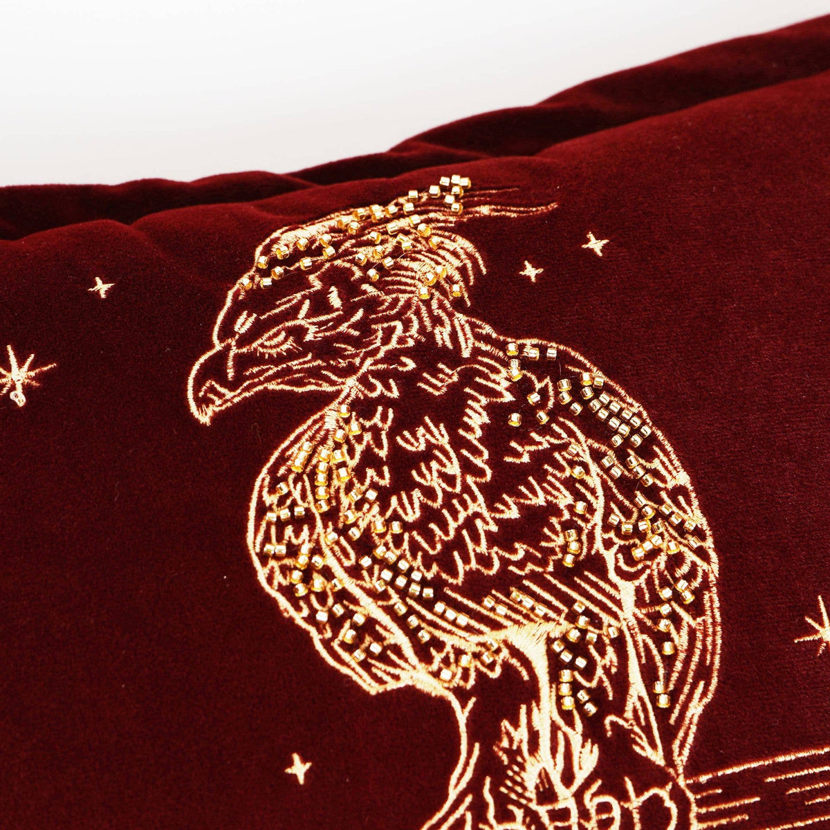 Coussin Harry Potter phénix Fumseck brodé doré sur tissu effet velours, Widdop