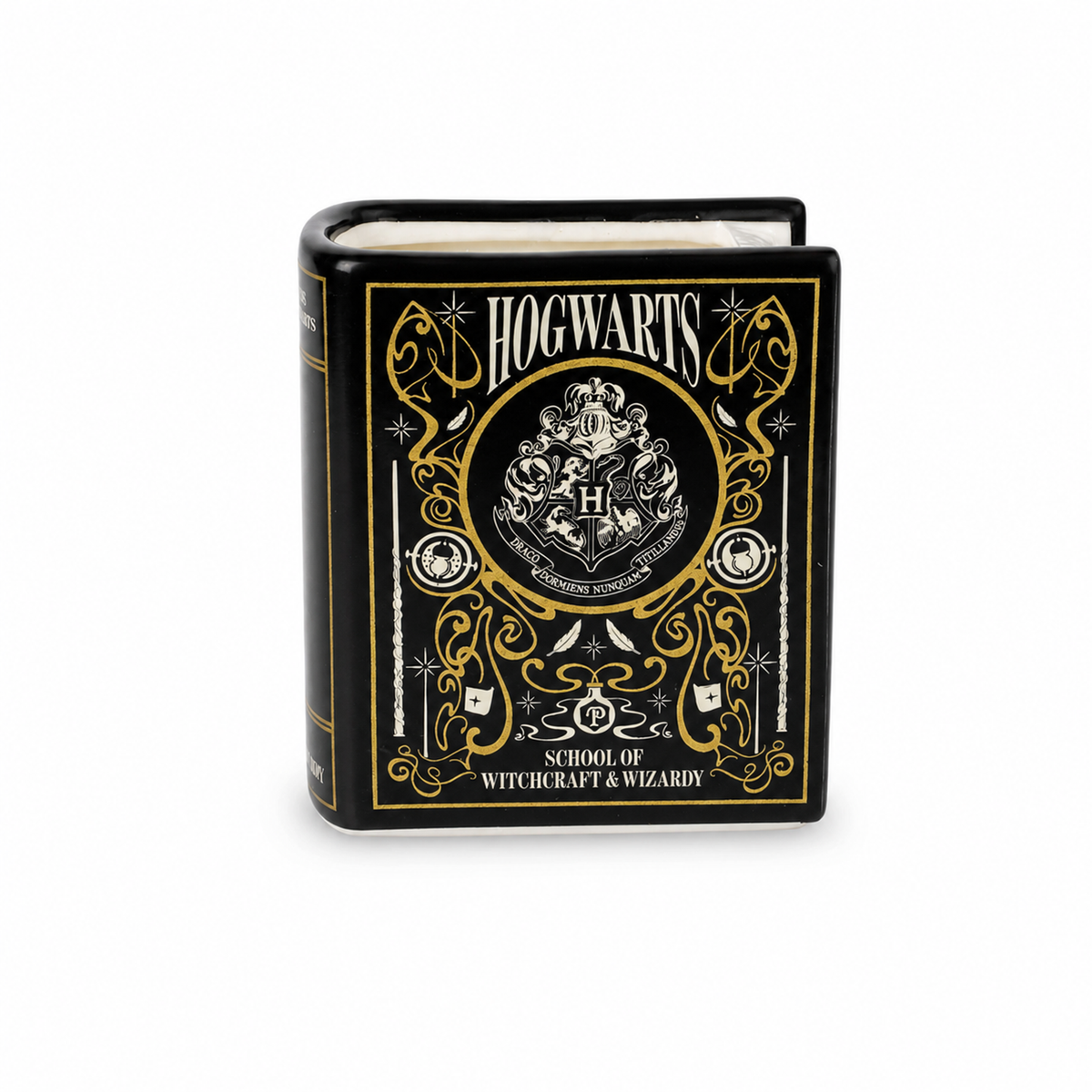 Bougie Harry Potter en céramique noire et dorée en forme de livre de Poudlard