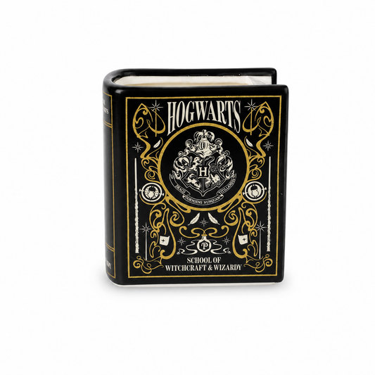 Bougie Harry Potter en céramique noire et dorée en forme de livre de Poudlard