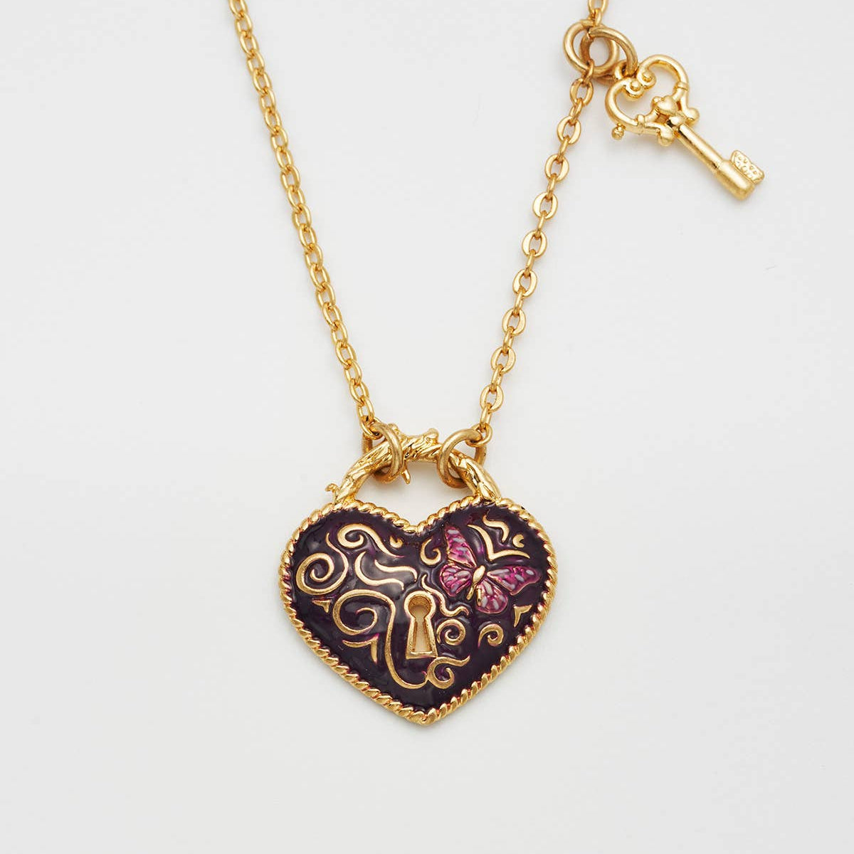 Collier Fable England Eve, pendentif cœur cadenas bordeaux et clé, plaqué or 22 carats