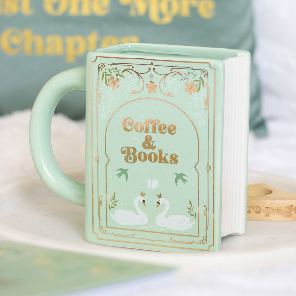 Mug en céramique en forme de livre vert pastel Coffee & Books avec motifs floraux et cygnes dorés