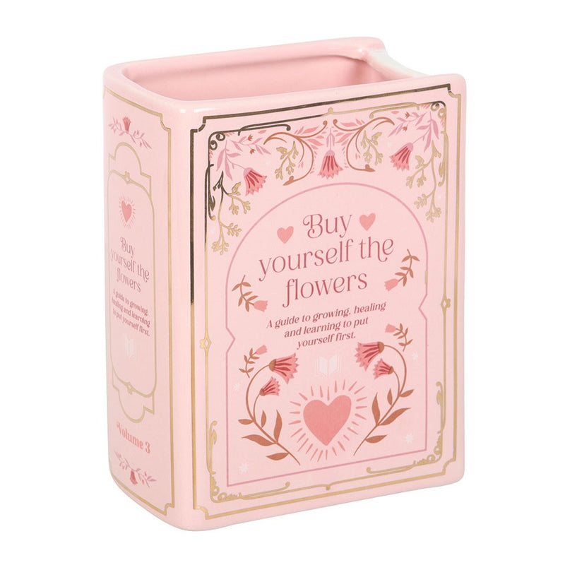 Vase en céramique en forme de livre rose avec inscription dorée Buy Yourself the Flowers