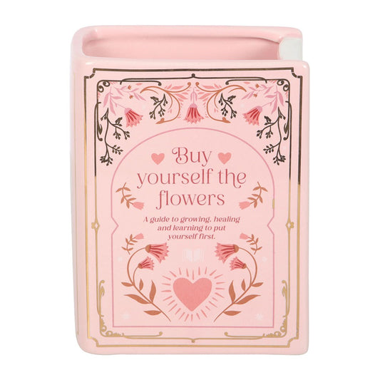 Vase en céramique en forme de livre rose avec inscription dorée Buy Yourself the Flowers