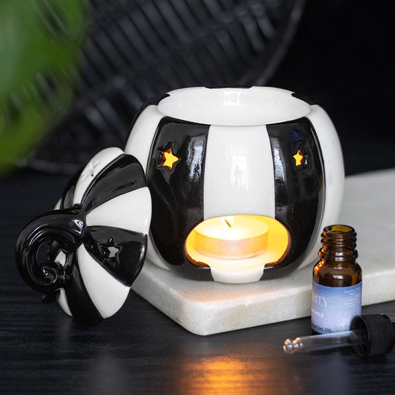 Brûle-parfum citrouille en céramique rayée noir et blanc avec couvercle pour fondants parfumés