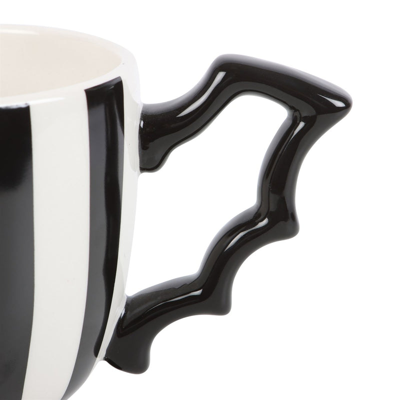Tasse en céramique rayée noir et blanc avec anse en forme d'aile de chauve-souris, Halloween