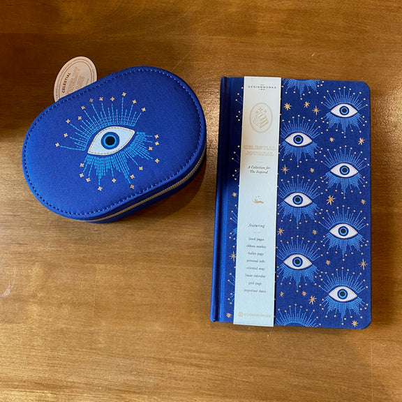Carnet relié Designworks Ink Starry Eyed, couverture tissu bleu profond aux yeux mystiques dorés
