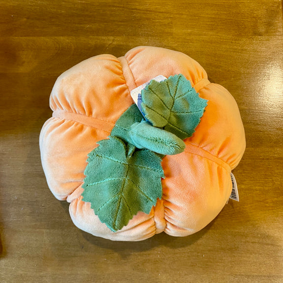 Peluche citrouille orange Bukowski de 25 cm avec sourire brodé et feuilles en tissu vert