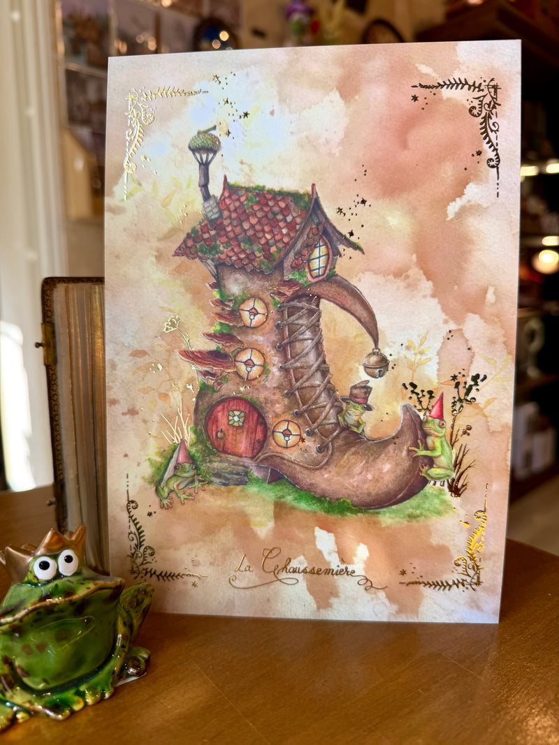Illustration La Chaussemière, maison féerique en forme de chaussure avec trois grenouilles