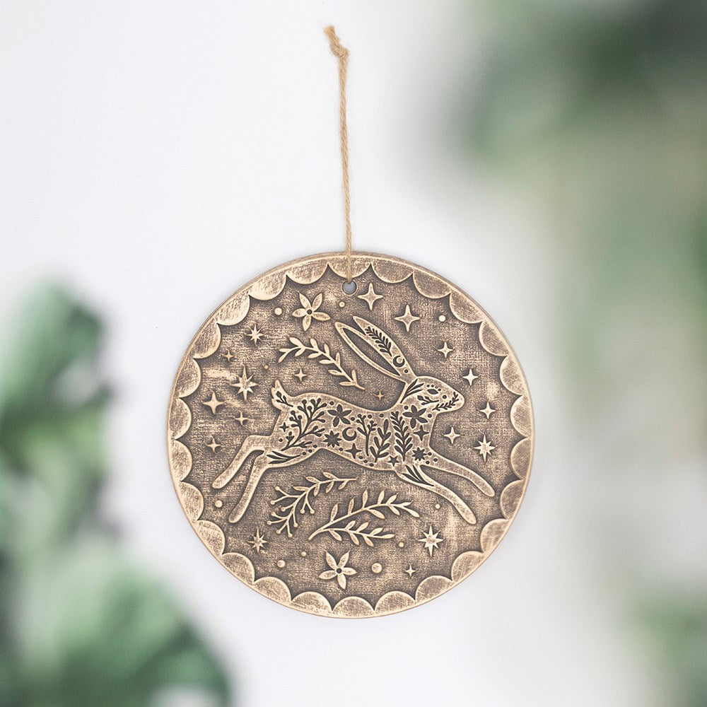 Plaque murale lièvre en terre cuite effet bronze vieilli 20 cm, décor fleurs, étoiles et lunes