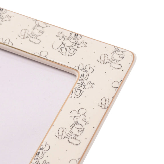 Cadre photo Disney en céramique blanche et dorée illustré de Mickey et Minnie Mouse