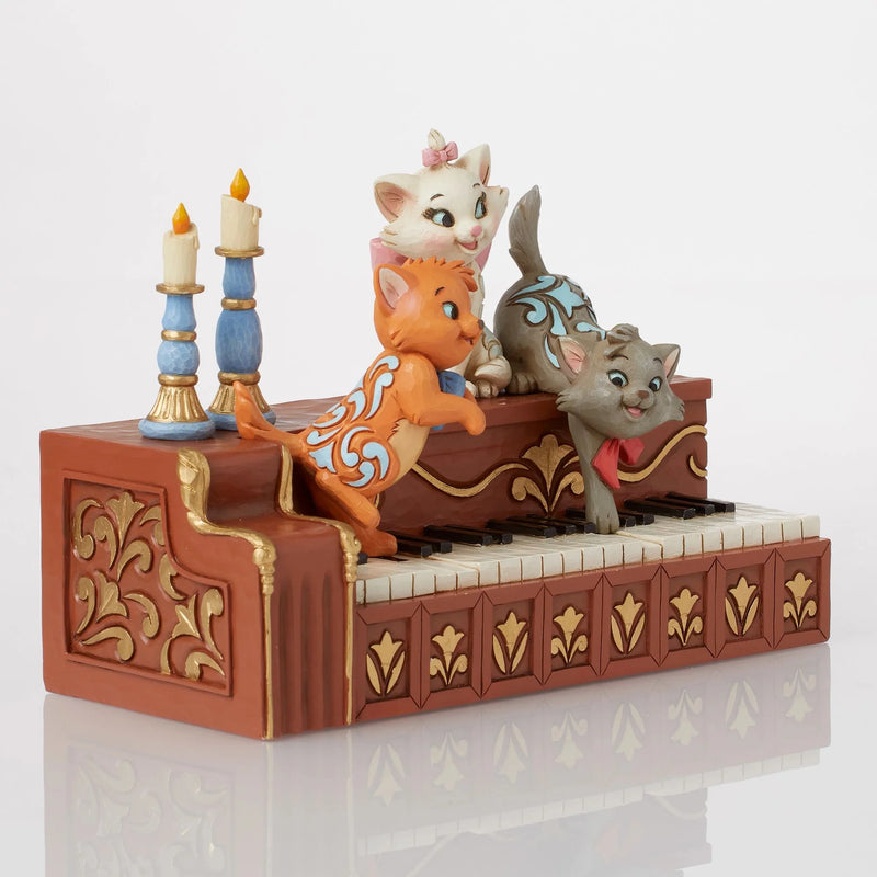 Figurine Disney Traditions Jim Shore des Aristochats Marie, Berlioz et Toulouse sur le piano