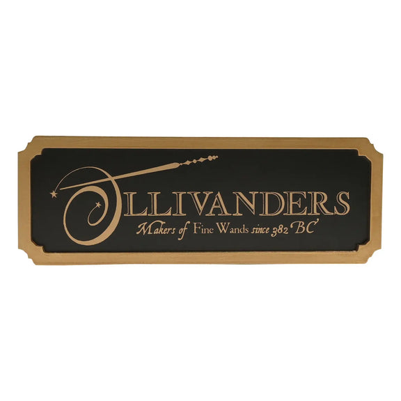 Enseigne murale Harry Potter Ollivanders en métal noir avec bordure dorée en bois