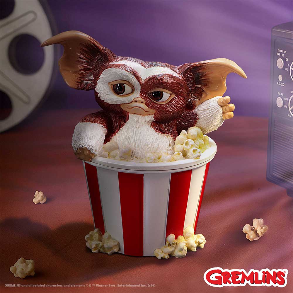 Boîte de collection Gremlins avec Gizmo surgissant d'un pot de popcorn rayé rouge et blanc