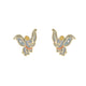 Boucles d'oreilles Disney Dumbo en vol, métal doré émaillé avec un strass scintillant sur chaque aile