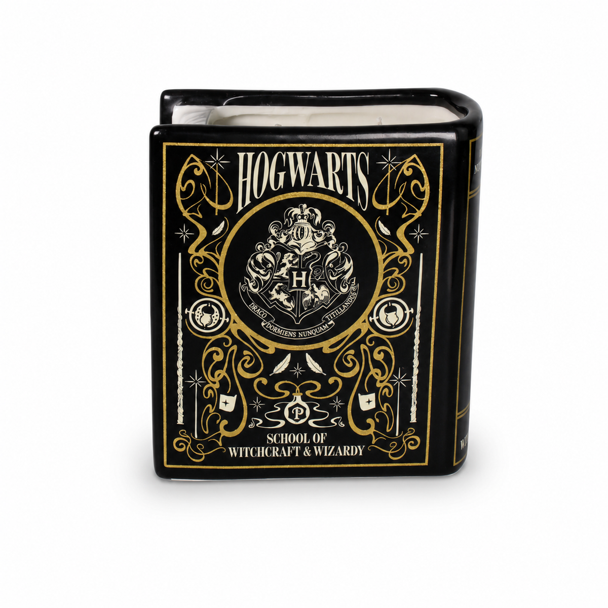 Bougie Harry Potter en céramique noire et dorée en forme de livre de Poudlard