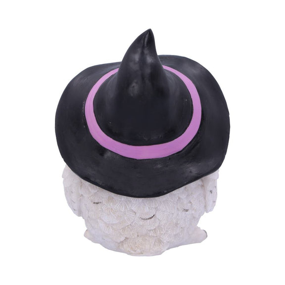 Statuette en résine d'une chouette blanche aux yeux dorés coiffée d'un grand chapeau de sorcière noir