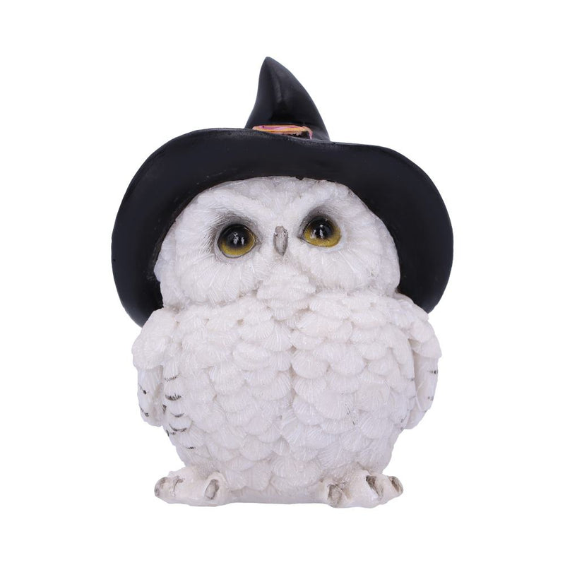 Statuette en résine d'une chouette blanche aux yeux dorés coiffée d'un grand chapeau de sorcière noir