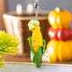 Porte-clés Studio Ghibli en forme d'épi de maïs abritant une noiraude et le petit Totoro blanc